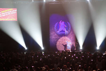 HONOLULU, HI - NOVEMBER 29, 2014: Comedian, fluffy, Gabriel Iglesias waves to fans at the end of...