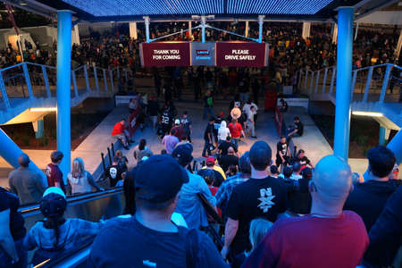 SANTA CLARA - MARCH 29: People ride down escalator toward mass transit and parking lot to leave...