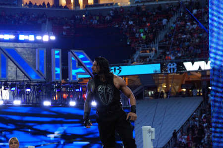 SANTA CLARA - MARCH 29: Roman Reigns wrestler stands on top turnbuckle before start of championship matchh at Wrestlemania 31 at the Levi's Stadium in Santa Clara, California on March 29, 2015.のeditorial素材