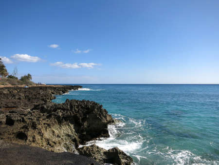 Lava Rocky Shoreline on Waianae Coastline with Pacific Ocean on Oahu, Hawaii.の写真素材