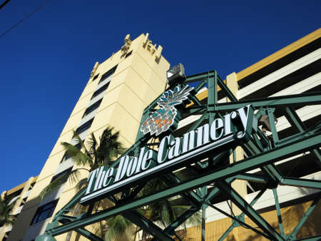 HONOLULU, HI - JUNE 4, 2015: The Dole Cannery Sign in front of building island of Oahu in the state of Hawaii.  Dole Cannery is an office and retail complex that offers specialty shops, superstores, entertainment, eateries, and service providers: tenants,のeditorial素材