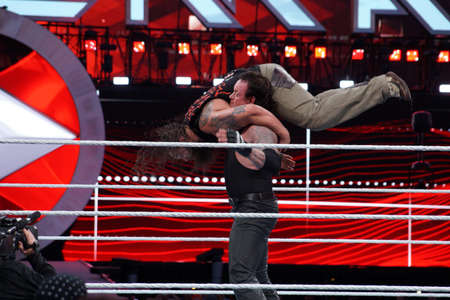SANTA CLARA - MARCH 29: WWE Wrestler the Undertaker tombstone piledrivers Bray Wyatt middle of ring during match at Wrestlemania 31 at the Levi's Stadium in Santa Clara, California on March 29, 2015.のeditorial素材