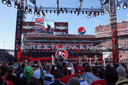 SANTA CLARA - MARCH 29: Triple H with DX and Sting with NWO stare down in the ring after match with NWO and DX on the outside at Wrestlemania 31 at the Levi's Stadium in Santa Clara, California on March 29, 2015.のeditorial素材
