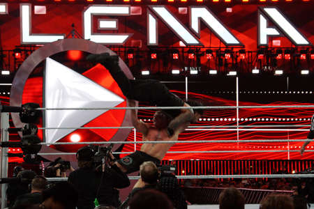 SANTA CLARA - MARCH 29: WWE Champion Brock Lesner F-5ing Roman Reigns off the top of his shoulders at Wrestlemania 31 at the Levi's Stadium in Santa Clara, California on March 29, 2015.のeditorial素材