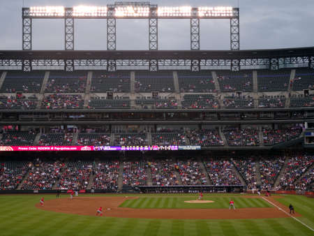 DENVER - JULY 7: Angels pitcher throws pitch to batter with Rockies batter waiting on incoming pitch with infield and ballpark in view on July 7, 2015 in Denver, Colorado.のeditorial素材