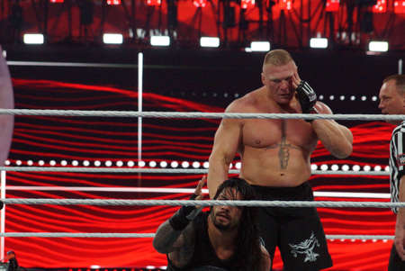 SANTA CLARA - MARCH 29: WWE Champion Brock Lesner holds face as he grabs Roman Reigns who holds hand out at Wrestlemania 31 at the Levi's Stadium in Santa Clara, California on March 29, 2015.のeditorial素材