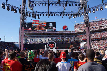SANTA CLARA - MARCH 29: WWE Wrestler Seth Rollins stands in the ring as Randy Orton makes his entrance to ring at Wrestlemania 31 at the Levi's Stadium in Santa Clara, California on March 29, 2015.のeditorial素材