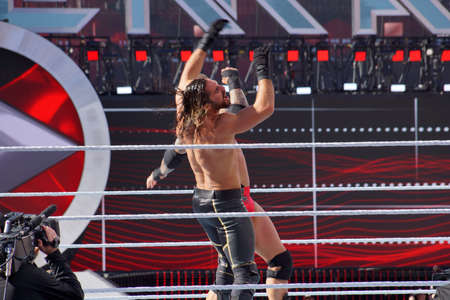 SANTA CLARA - MARCH 29: WWE Wrestler Seth Rollins gets uppercut off the ropes from Randy Orton in the ring at Wrestlemania 31 at the Levi's Stadium in Santa Clara, California on March 29, 2015.のeditorial素材