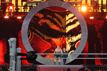 SANTA CLARA - MARCH 29: WWE Champion Brock Lesner and agent Paul Heyman enters arena at, showcase of the immortals, Wrestlemania 31, as night falls with fans cheering at the Levi's Stadium in Santa Clara, California on March 29, 2015.のeditorial素材