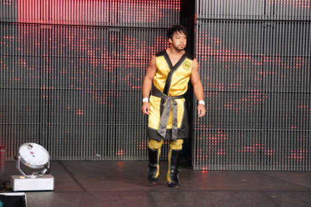 SAN JOSE - MARCH 28: NXT Wrestle Hideo Itami, also know as Kenta Kobayashi is a Japanese professional wrestler, best known by his ring name Kenta. enters to arena for match at WWE Axxess event at the McEnery Convention Center in San Jose, California on Maのeditorial素材