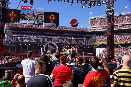 SANTA CLARA - MARCH 29: WWE Wrestler Big Show gets double dropkick as he holds ring ropes during andre the giant battle royal 2015 at Wrestlemania 31 at the Levi's Stadium in Santa Clara, California on March 29, 2015.のeditorial素材