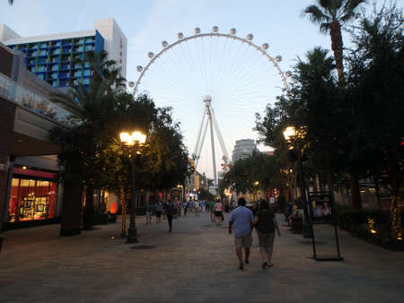 LAS VEGAS - JUNE 27, 2015 - People explore the Linq the shopping and dining area leading up to The High Roller Wheel  at the center of the Las Vegas Strip on June 27, 2015 in Las Vegas. The High Roller is the world's largest observation wheel.のeditorial素材