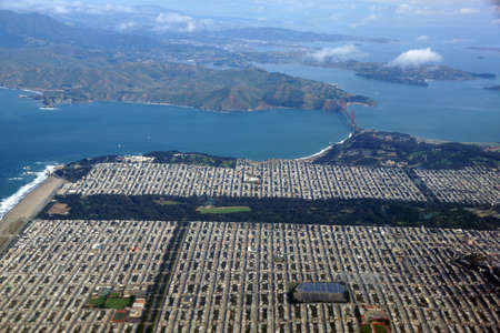 Golden Gate Bridge, Ocean Beach and the Sunset District of San Francisco and Marin County seen from the Air.の写真素材