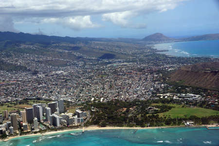 Aerial view of Diamondhead, Kapiolani Park, Waikiki, Ala Wai Canal, Kapahulu town, Pacific ocean, clouds, Kahala and Golf Course on Oahu, Hawaii.の写真素材