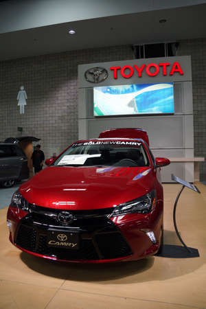 HONOLULU - MARCH 14, 2015:  The bold new Toyota Camry car on display at the Motor Show exhibition - 2015 First Hawaiian International Auto Show at the Convention Center in Oahu, Hawaii.  March 14, 2015.のeditorial素材
