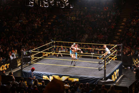 SAN JOSE - MARCH 27: WWE NXT Superstar Kalisto puts sleeper hold on wrestler Solomon Crowe during match at the San Jose Event Center in San Jose, California on March 27, 2015.のeditorial素材