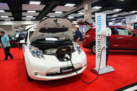 HONOLULU - MARCH 14, 2015:  100% Electric Nissan Leaf car on display at the Motor Show exhibition - 2015 First Hawaiian International Auto Show at the Convention Center in Oahu, Hawaii.  March 14, 2015.のeditorial素材