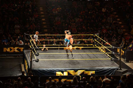 SAN JOSE - MARCH 27: WWE NXT Superstar Kalisto gets back dropped by wrestler Solomon Crowe during match at the San Jose Event Center in San Jose, California on March 27, 2015.のeditorial素材