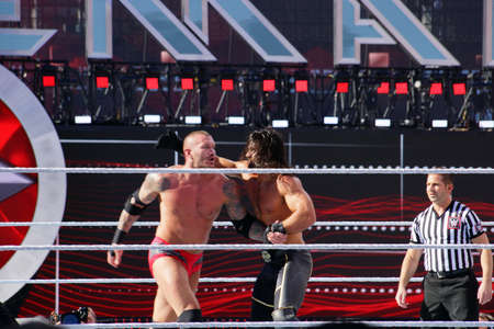 SANTA CLARA - MARCH 29: WWE Wrestler Seth Rollins throws Randy Orton into the ropes during match at Wrestlemania 31 at the Levi's Stadium in Santa Clara, California on March 29, 2015.のeditorial素材