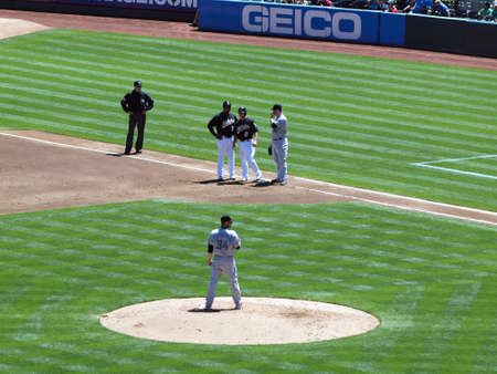 Blue Jays vs. Athletics: Blue Jays Pitcher Marc Rzepczynski stands on mound with As player standing on first base between baseball plays.  Taken on August 18 2010 at Coliseum in Oakland California.のeditorial素材