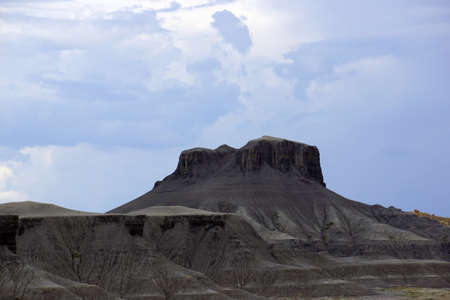 Grey Mountain Plateu in Utah with clouds in sky.の写真素材