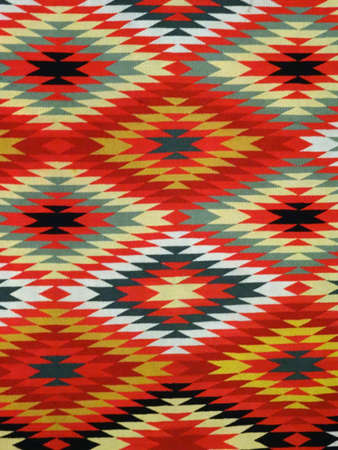 Pattern Red, Orange, White, Green, Black, and blue Diamond Blanket/ Rug - Navajo Artist, made about 1885 of cotton and wool.の写真素材