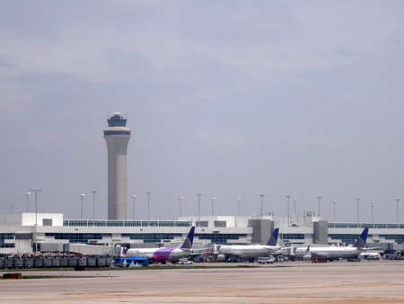 DENVER - JULY 8: Planes parked at Denver International Airport, often referred to as DIA, is an airport in Denver, Colorado, United States. At 34,000 acres, it is the largest airport in the United States by total land area.on July 7, 2015 in Denver, Colorのeditorial素材