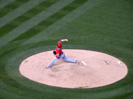 DENVER - JULY 7: Angels pitcher Andrew Heaney steps forward to throw pitch off mound on July 7, 2015 in Denver, Colorado.のeditorial素材