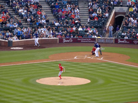 DENVER - JULY 7: Angels pitcher Andrew Heaney throws pitch to Rockies batter Troy Tulowitzki waiting on incoming pitch on July 7, 2015 in Denver, Colorado.のeditorial素材