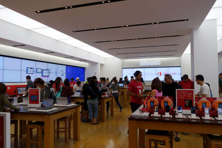 HONOLULU, HI - NOVEMBER 27:  People look at products inside Microsoft Windows Store in Honolulu at the Ala Moana Center who's technology is in most modern computers on November 27, 2014.のeditorial素材