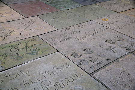 LOS ANGELES - JANUARY 23:  Celebrity  Hand prints on ground in cement on Hollywood Boulevard on January 23, 2014, Los Angeles.  There are nearly 200 celebrity handprints in the concrete of Chinese Theatre's forecourt.のeditorial素材