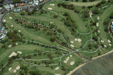 Aerial of Waialae Country Club in Kahala on Oahu, Hawaii.  Home to the SONY Open in Hawaii, Waialae Country Club is one of only 40 country club courses throughout the nation chosen to host a sanctioned PGA Tour event. の写真素材