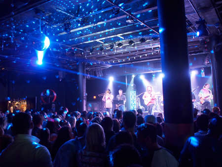 HONOLULU, HI - JULY 14: Mike Love Band plays music indoors with cool lighting at Crossroads at Hawaiian Brians on July 14 2016, Honolulu, Hawaii.のeditorial素材