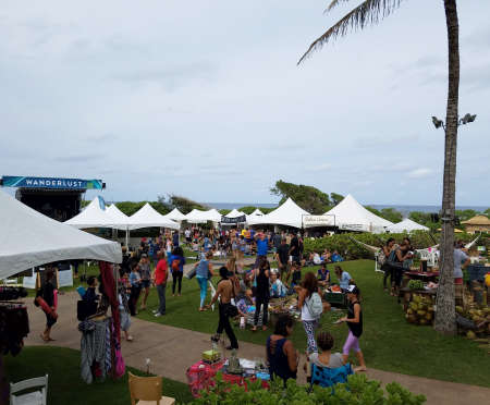 NORTH SHORE, HAWAII - FEBRUARY 25: People hang out and check out booths at Wanderlust yoga event on the North Shore, Hawaii on February 25, 2017.のeditorial素材