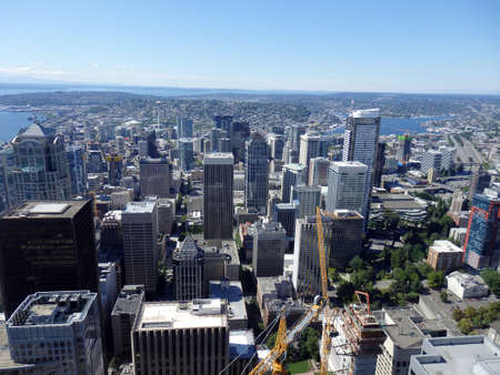 SEATTLE-- JUNE 25:  Aerial view of downtown Seattle buildings, Union Lake, Space Needle and Cranes leading to the horizon on June 25, 2016 in Seattle, WA.のeditorial素材