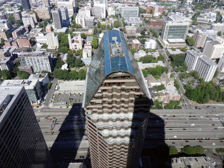 SEATTLE-- JUNE 25: Aerial view of downtown Seattle buildings, Seattle City Light, 700 5th Ave, and Highway on June 25, 2016 in Seattle, WA.のeditorial素材