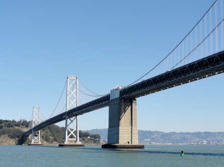 San Francisco side of Bay Bridge with Oakland in the distance on a clear day.の写真素材
