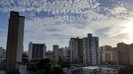 Makiki, and Honolulu Cityscape looking to the ocean from high up at sunset with houses and modern highrises, and other small buildings on a beautiful day June 29 2016.のeditorial素材