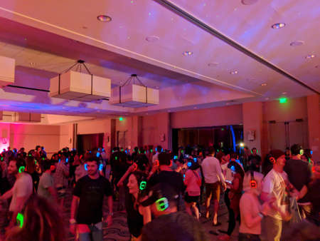 North Shore, Hawaii - March 2, 2018:  Silent Disco Dance party at Music festival Wanderlust yoga event on the North Shore, Hawaii.のeditorial素材