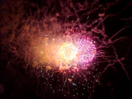 New Years Fireworks burst in the air at Outdoor New Years Party December 31, 2014 in Honolulu,...