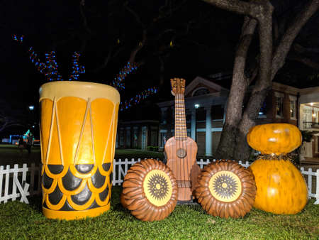 Honolulu - December 18, 2017:  Large Replicas of Hawaiian Instruments including the ukulele, Ipu, pahu, kÃ¢`eke `eke, Uli Uli on Display in front of Honolulu Hale, the Mayor Office, as part of Honolulu City Lights runs annually throughout the month of Decのeditorial素材