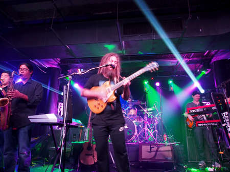 Honolulu - January 5, 2017: Mike Love Band plays music indoors with cool lighting at Crossroads at...