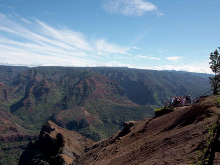 Kauai, Hawaii - November 12, 2017: People look and take photos of view of Lush Mountains of Waimea Canyon on Kauai, Hawaiiのeditorial素材