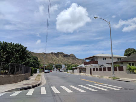 Honolulu - June 6, 2018: Road of Campbell Avenue leading towards Diamond Head on Oahu, Hawai on a...