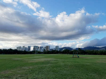 Kapiolani Park and Buildings of Honolulu with clouds in the air on Oahu, Hawaii.