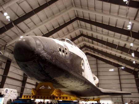 Los Angeles - January 21, 2014:   Space Shuttle Endeavor hangs inside the California Science Center in Exposition Park.  Space Shuttle Endeavour is a retired orbiter from NASA's Space Shuttle program and the fifth and final operational shuttle built. It eのeditorial素材