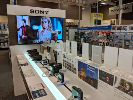 Honolulu - August 10, 2018: Sony Logo and Camera display inside Best Buy Store.  Sony Corporation is a Japanese multinational conglomerate corporation headquartered in KÅnan, Minato, Tokyo. Its diversified business includes consumer and professional elecのeditorial素材