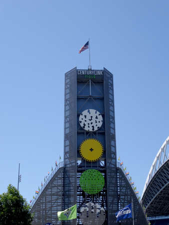 Seattle - June 26, 2016: USA Flag flies above CenturyLink. Home of the Seattle Seahawks (NFL), and Sounders (MLS).のeditorial素材