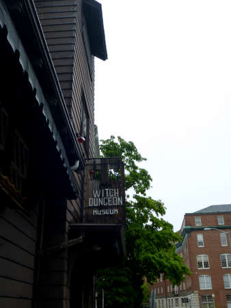 Salem - June 5, 2014:  Witch Dungeon Museum - Sign.  The Musuem features Live reenactment shows of...