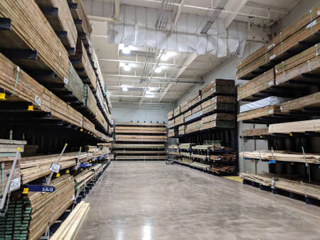 Honolulu - June 18, 2018: Rows of Wood Lumber For Sale Inside Lowe's Home Improvement store.のeditorial素材
